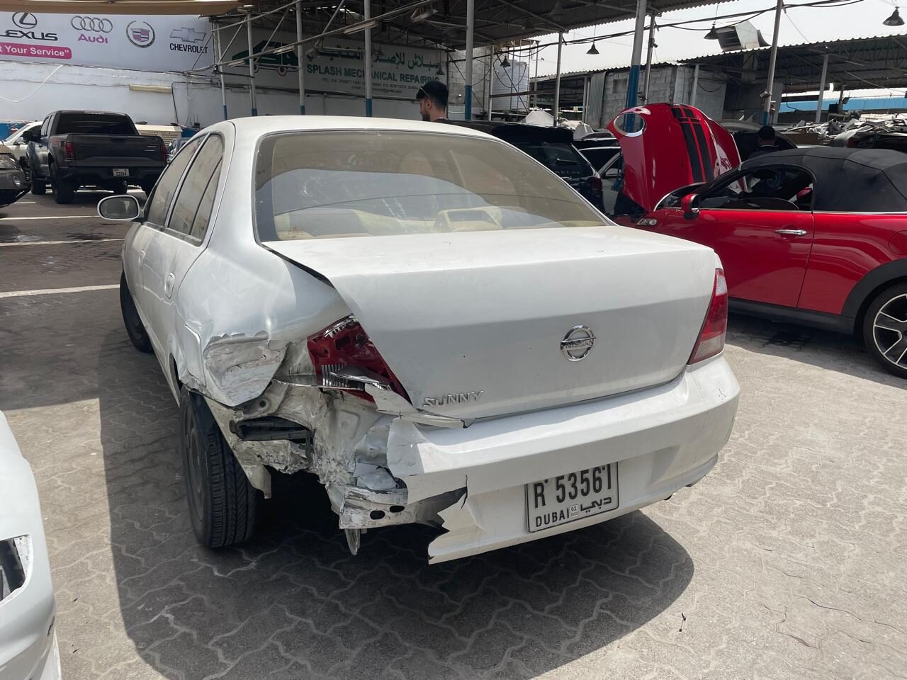 Sedan with rear impact damage